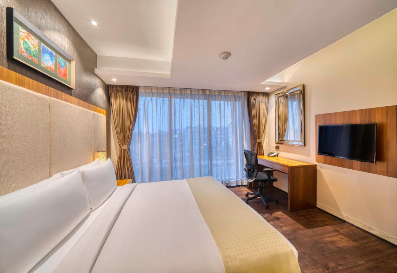 Holiday Inn Kolkata Airport By Ihg Екстер'єр фото A room at the hotel